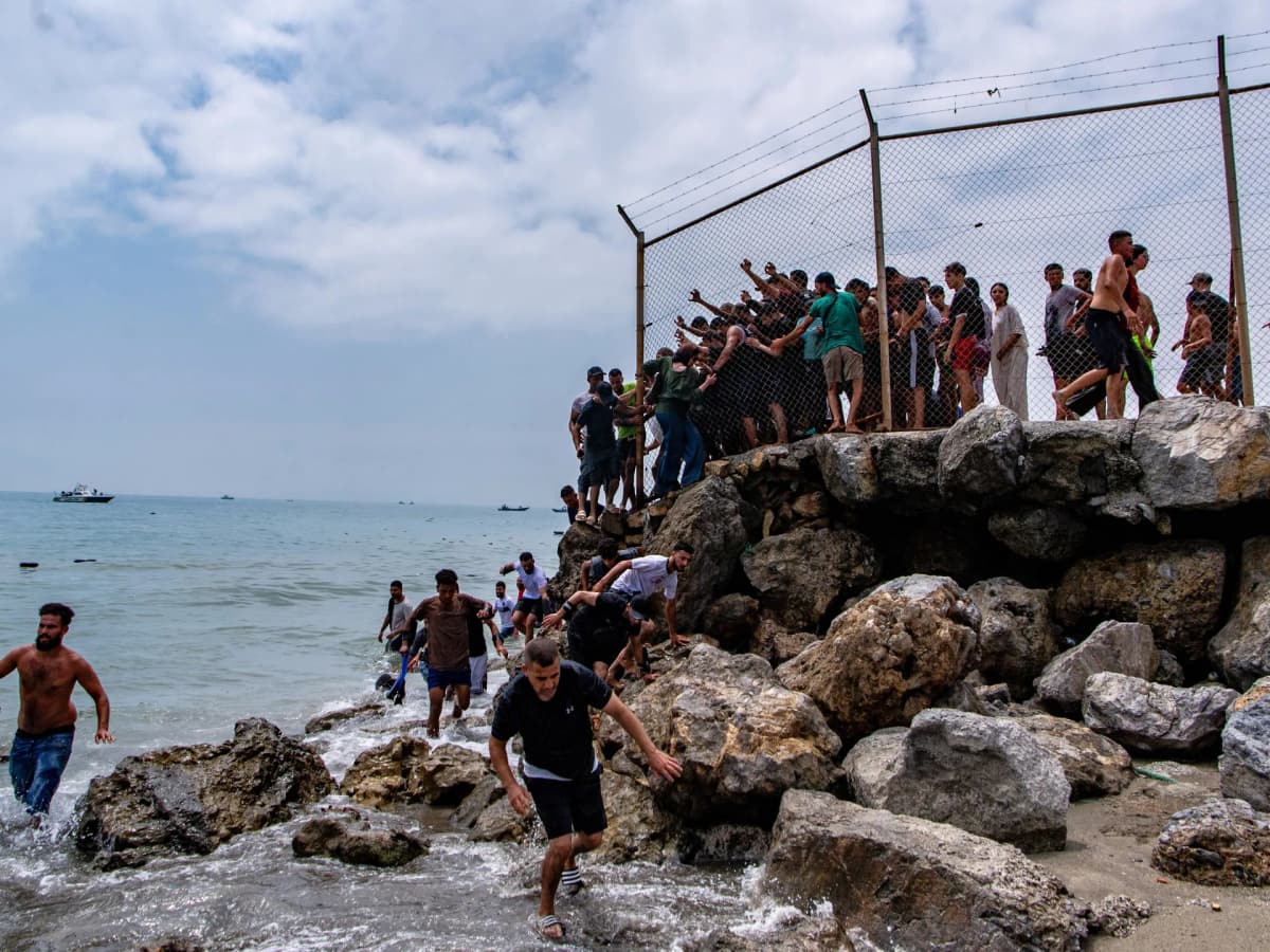 Ceuta Faces Migrant Surge as Thousands Cross from Morocco