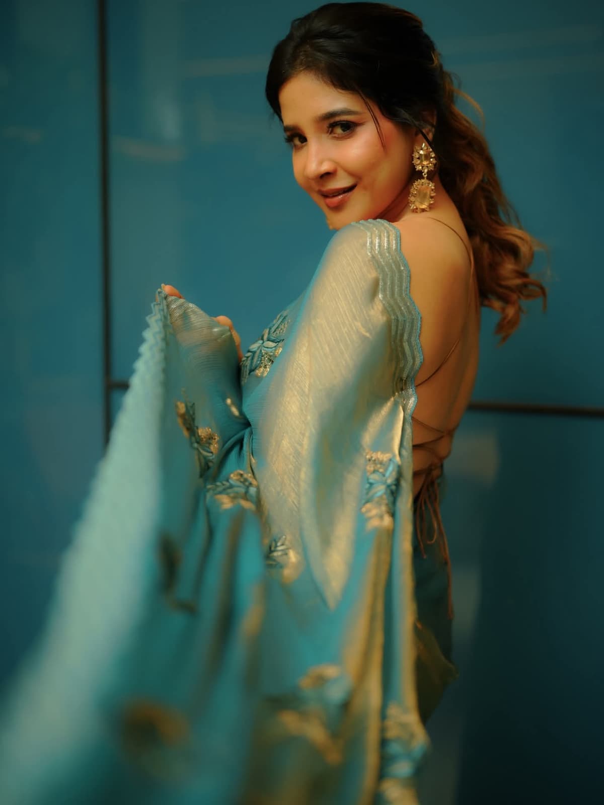 Sakshi Agarwal Shining In Blue Saree Photos Viral On Social Media
